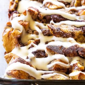 Cinnamon Roll Breakfast Bake - this is made from scratch, no canned cinnamon rolls. Who wouldn't want to wake up to this? the-girl-who-ate-everything.com