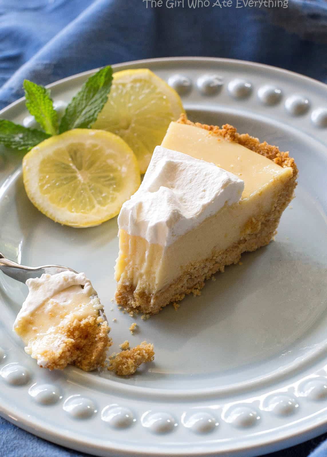 Lemon Pie - light, sweet and tart lemon pie with a thick graham cracker crust. From Joanna Gaines from Magnolia Market! the-girl-who-ate-everything.com