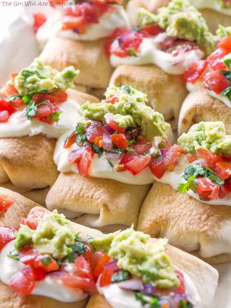 Mini Chicken Chimichangas - these mini Mexican appetizers are filled with creamy chicken and spicy Pepper Jack cheese. the-girl-who-ate-everything.com 