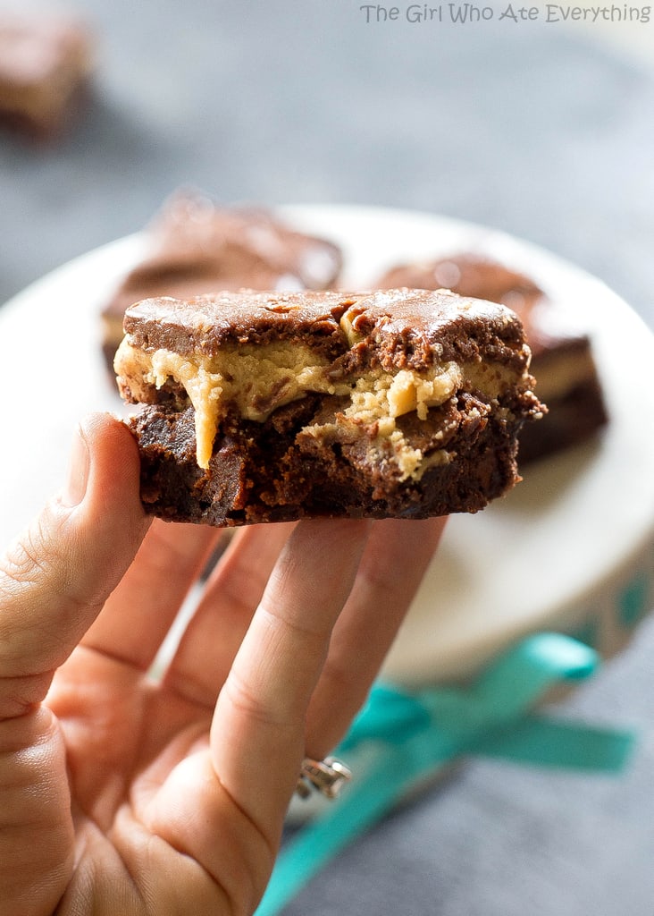 Turtle Buckeye Brownies - rich chocolate brownies, a peanut butter truffle layer, topped with a caramel chocolate pecan layer. The ultimate decadent dessert. the-girl-who-ate-everything.com