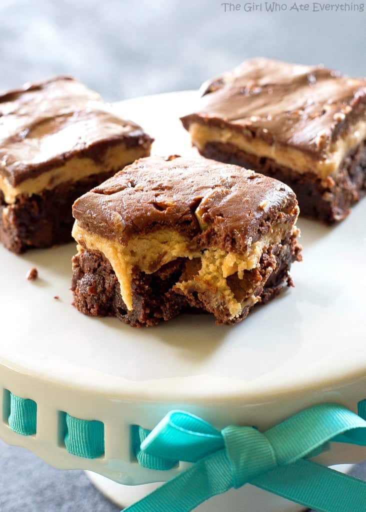 Turtle Buckeye Brownies - rich chocolate brownies, a peanut butter truffle layer, topped with a caramel chocolate pecan layer. The ultimate decadent dessert. the-girl-who-ate-everything.com
