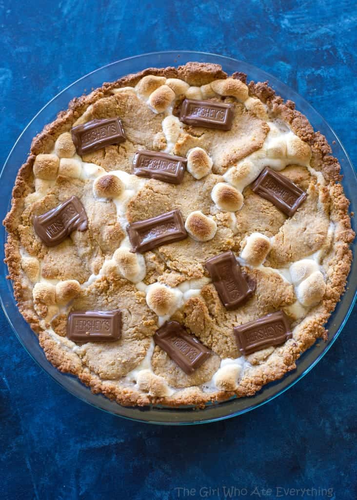 Easy S'mores Pie - layers of graham cracker dough, marshmallows, and chocolate. the-girl-who-ate-everything.com