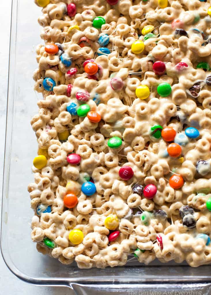 Cheerio Treats - an easy no-bake recipe with cheerios, marshmallows, peanut butter, and M&Ms. the-girl-who-ate-everything.com