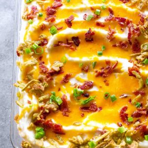 These Jalapeno Popper Mashed Potatoes are creamy mashed potatoes loaded with cheese, bacon, and crispy jalapenos. These will take your Thanksgiving (or Friendsgiving) to the next level. the-girl-who-ate-everything.com