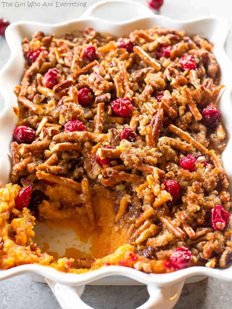 Pretzel Cranberry Sweet Potatoes - sweet potatoes topped with a sweet brown sugar pretzel topping and tart cranberries.
