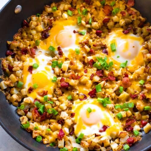 Skillet Baked Eggs with Potatoes and Bacon - Laughing Spatula