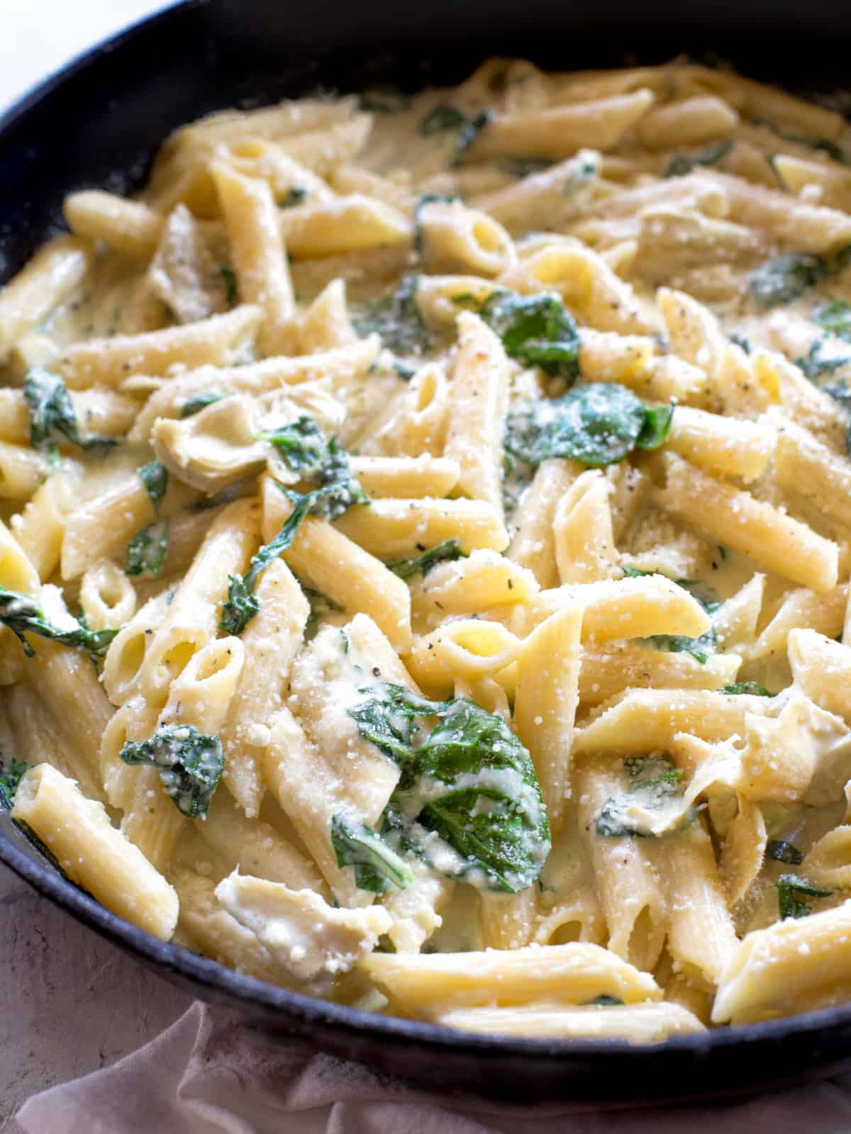 One-Pan Spinach Artichoke Pasta - The Girl Who Ate Everything