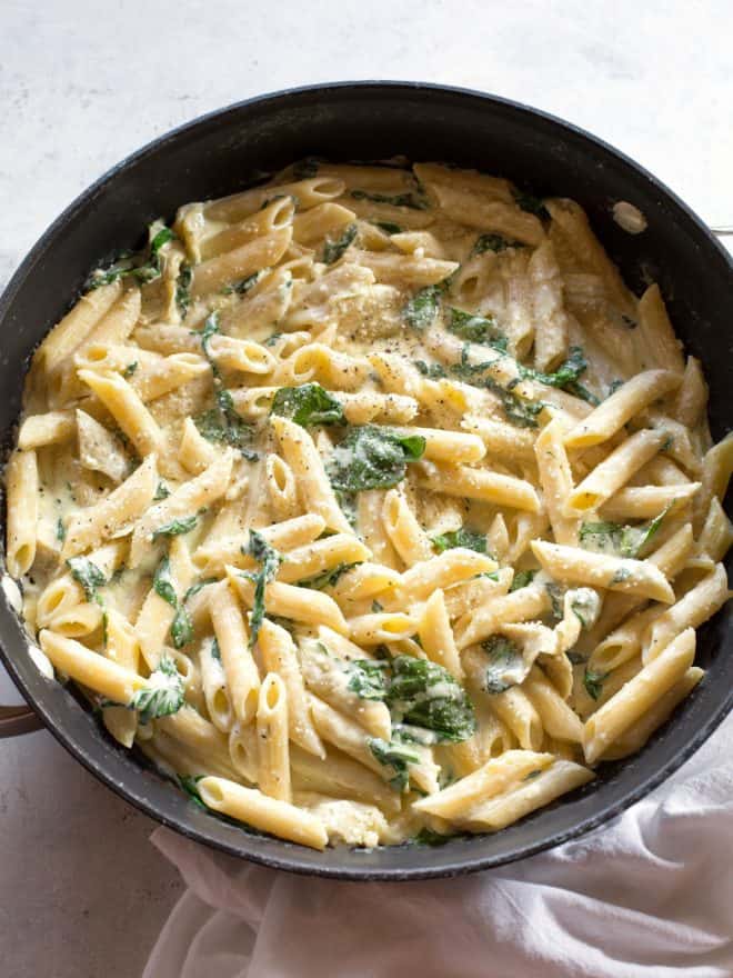 One-Pan Spinach Artichoke Pasta in a pan