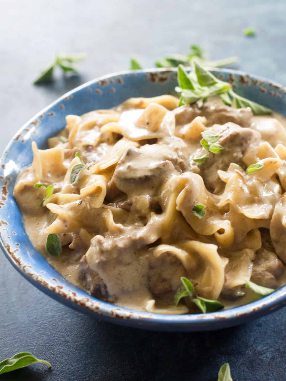 Beef Stroganoff is a creamy beef dinner usually served over buttered egg no...