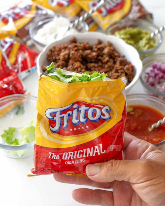 bag of fritos with lettuce