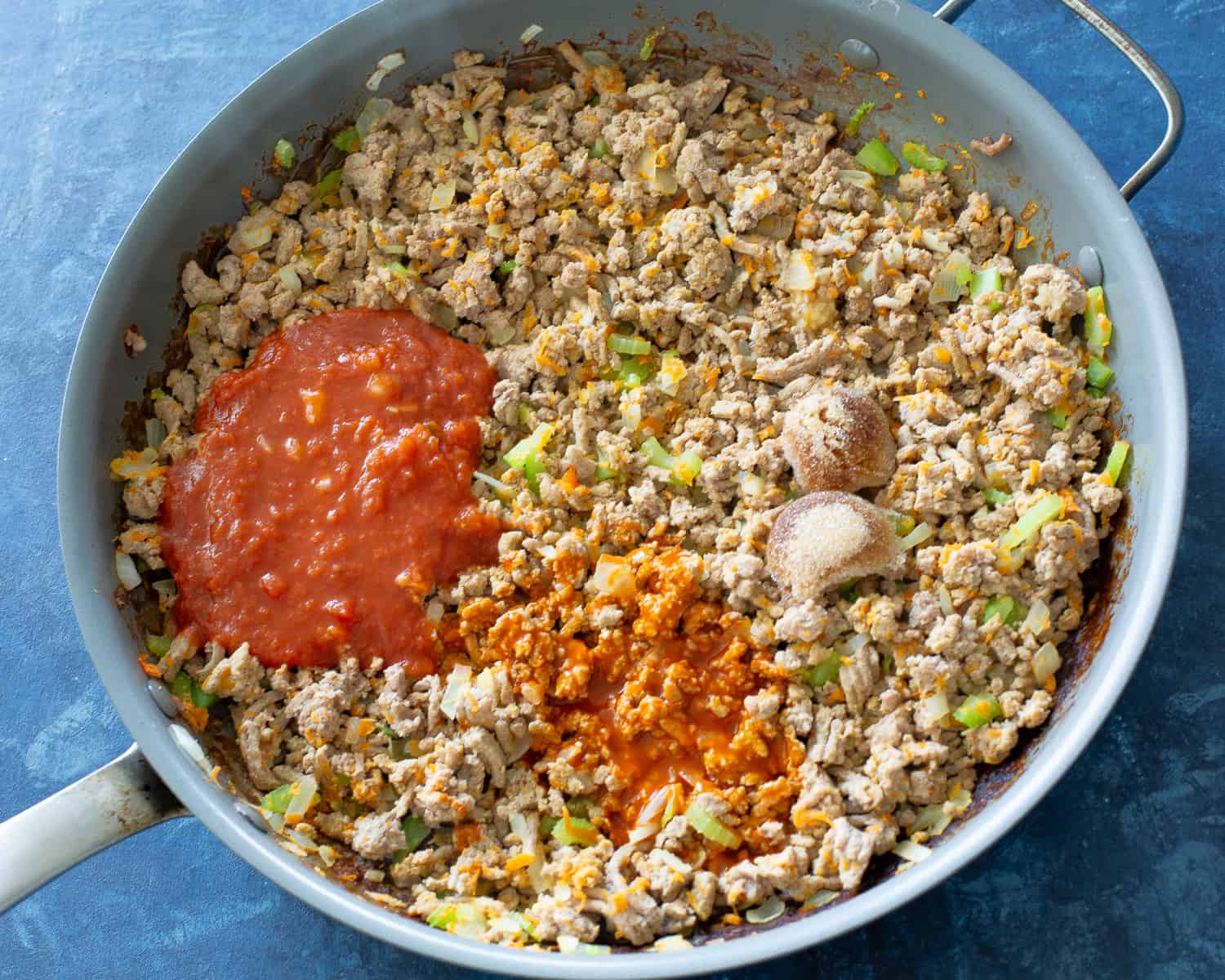 ground turkey with spices in a pan
