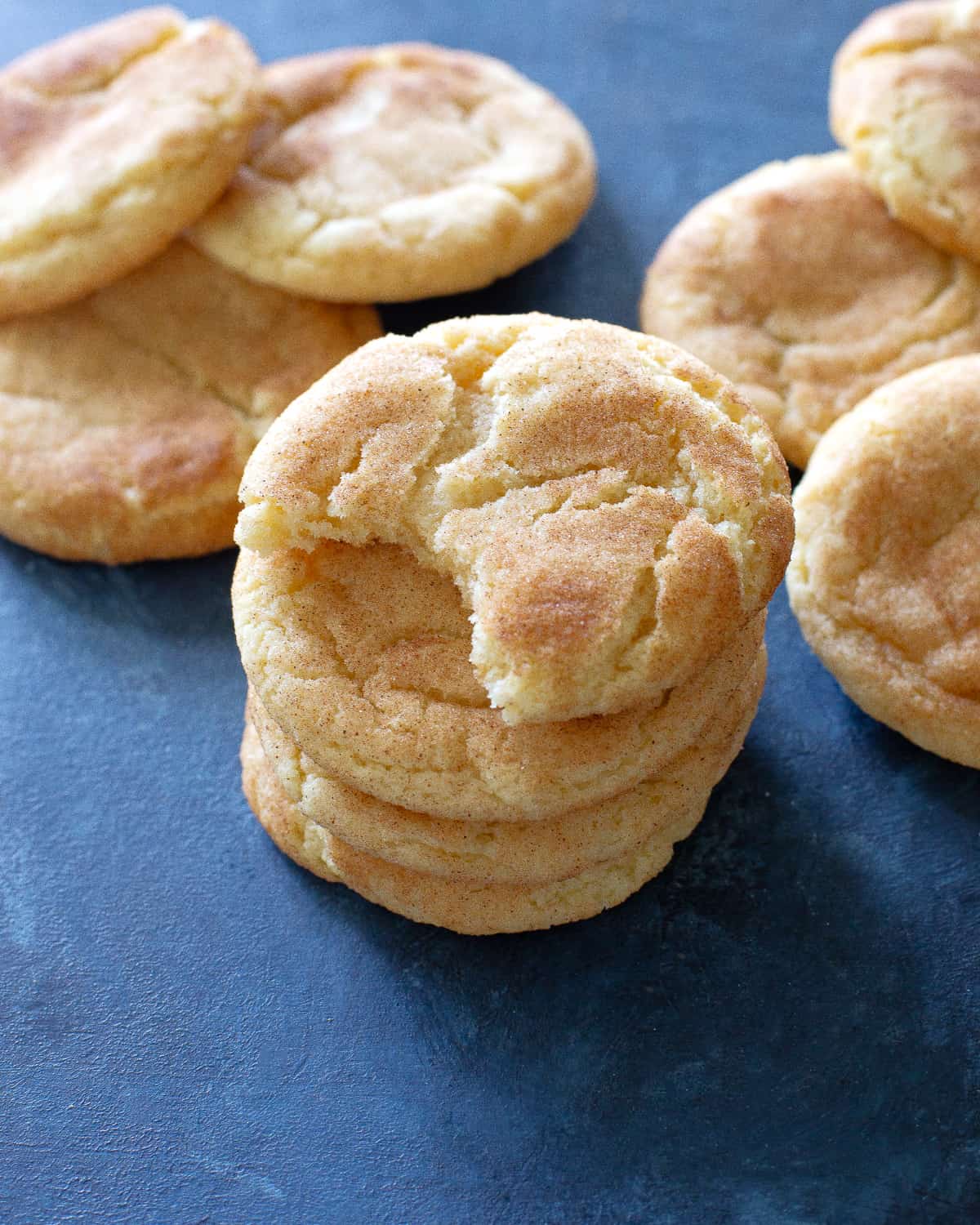a bite out of a snickerdoodle cookie