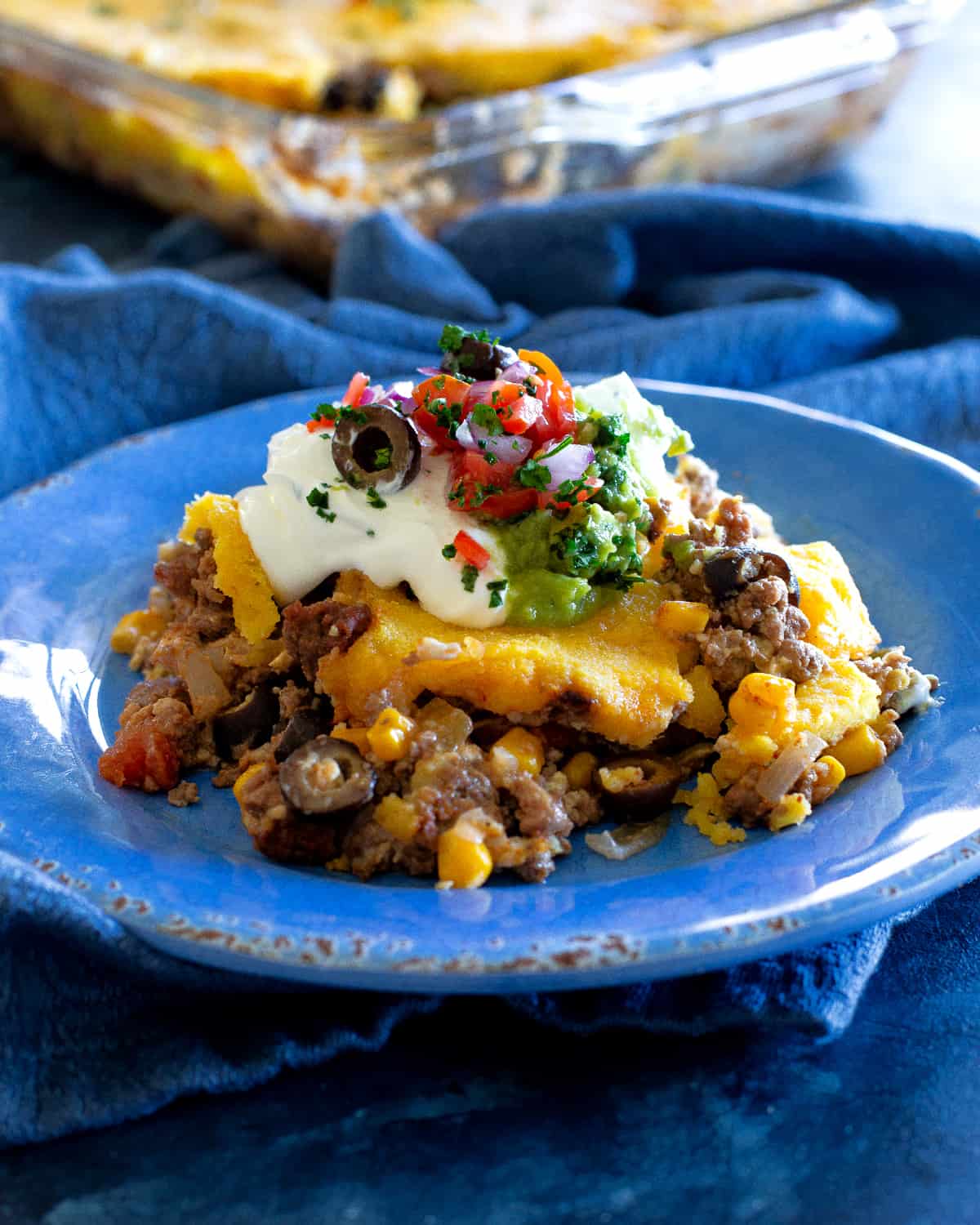 tamale pie on a blue plate