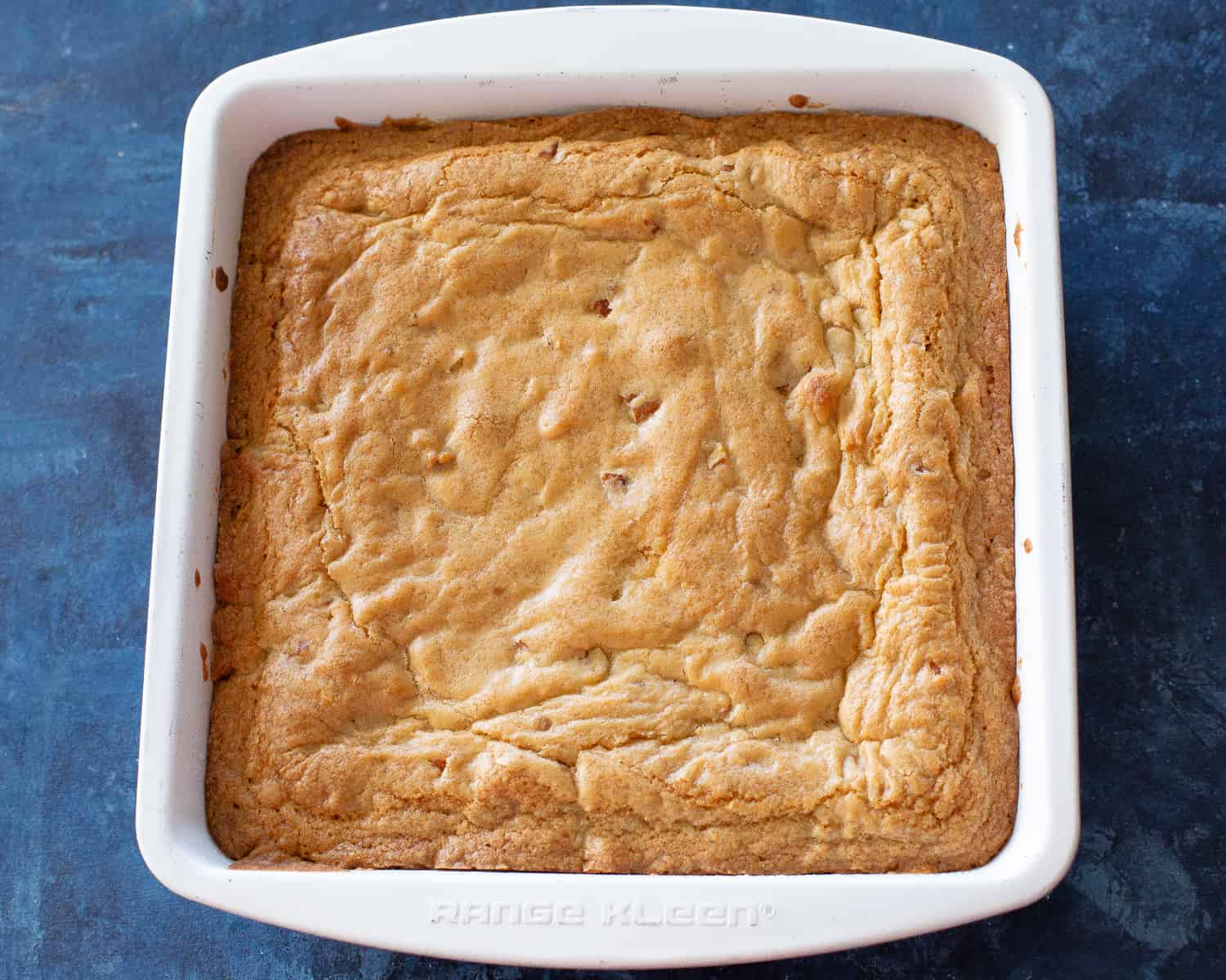 blondies baked in a white pan