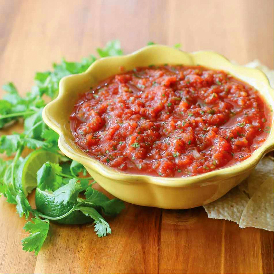 homemade salsa in a yellow bowl
