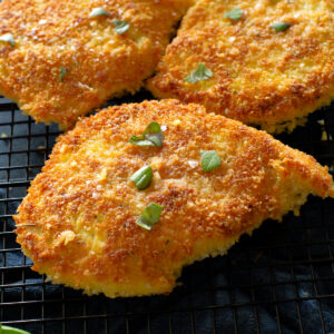 Chicken Cutlets are flavorful crispy chicken that are seasoned to perfection. This quick and easy dinner is a crowd pleaser! #chicken #cutlets