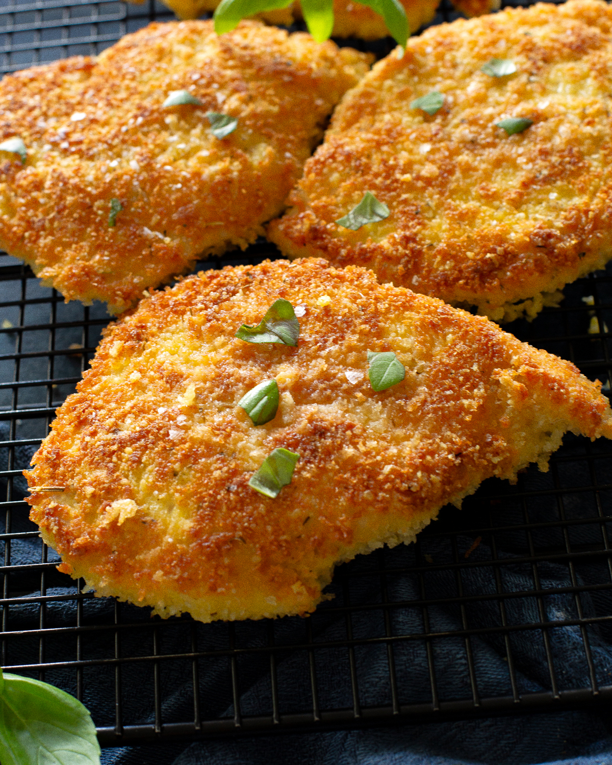 Chicken Cutlets are flavorful crispy chicken that are seasoned to perfection. This quick and easy dinner is a crowd pleaser! #chicken #cutlets
