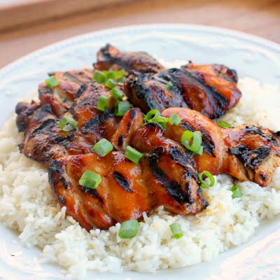 Hawaiian Grilled Chicken marinated in coconut milk, soy sauce, and green onions served over coconut rice. the-girl-who-ate-everything.com
