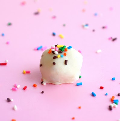 Cake Batter Truffles - cake batter flavored edible dough dipped in vanilla coating and lots and lots of sprinkles. the-girl-who-ate-everything.com